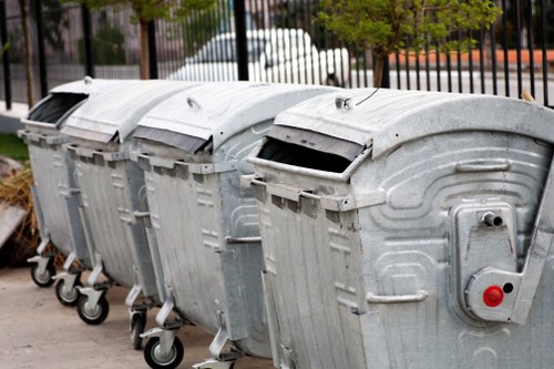 Person filling out a skip hire permit form